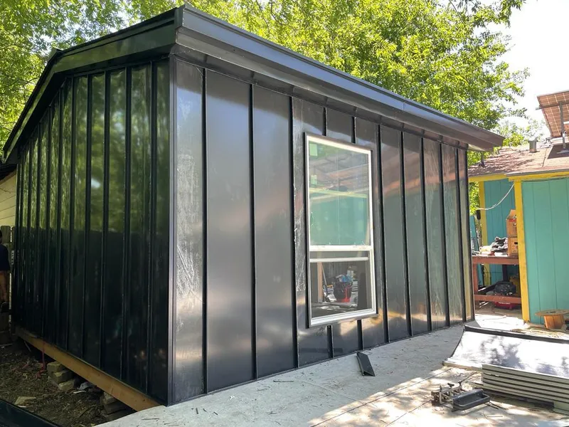 Black standing seam metal wall panels for Metal Roof Installation in Hereford