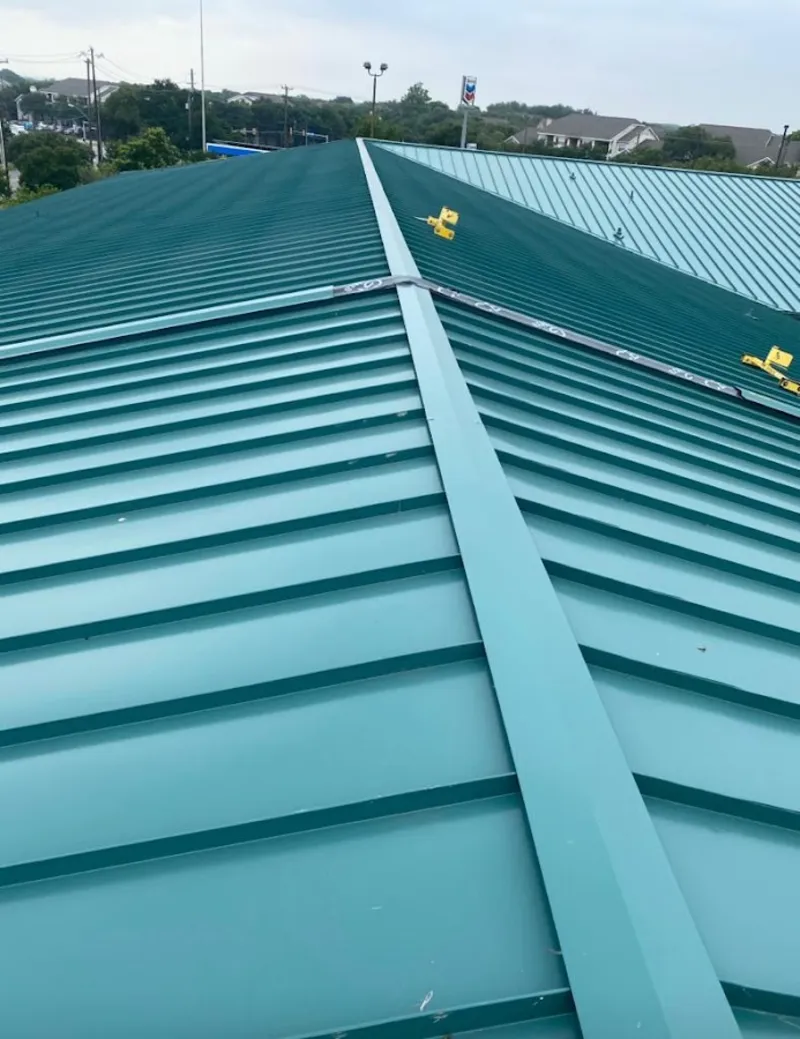 Green commercial metal roof ridge and valley for Metal Roof Repair in Hereford